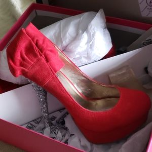 Red and silver Mix No.6 pumps